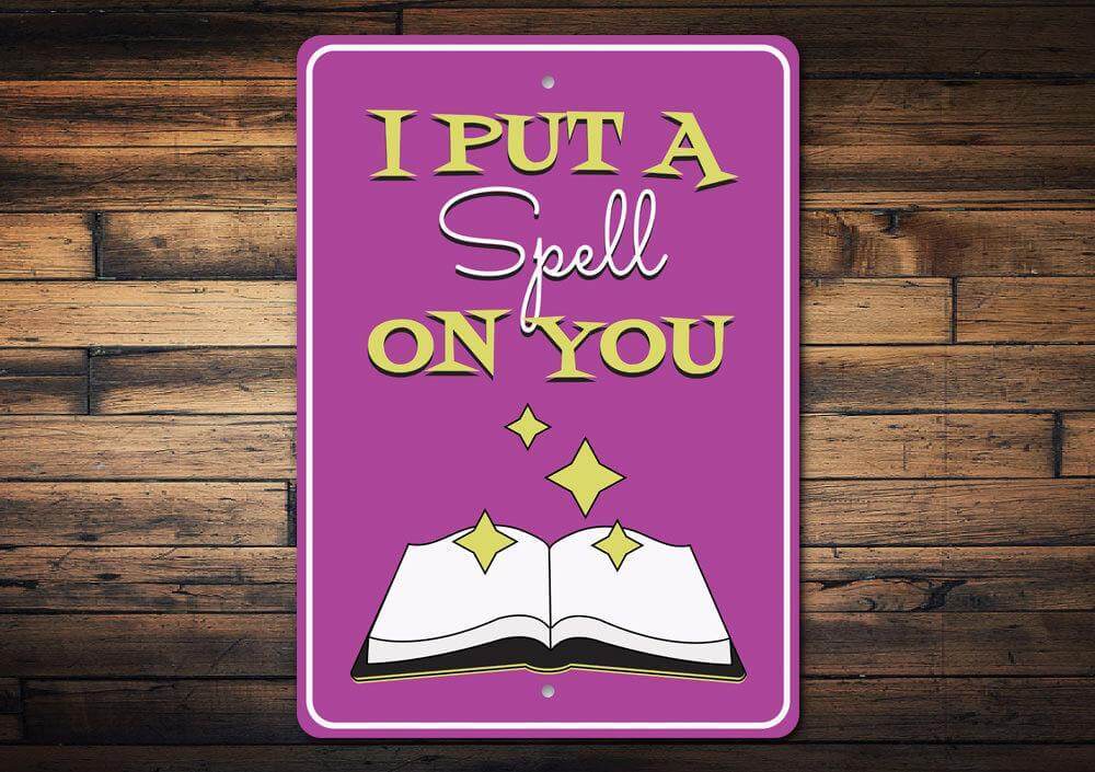Purple metal "I Put a Spell on You" sign with an open book and sparkling stars for Halloween decor