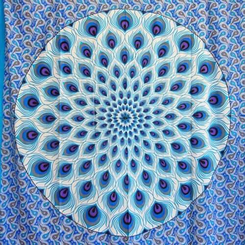 Blue geometric design peacock tapestry with intricate feather pattern in shades of blue and purple on handmade cotton fabric