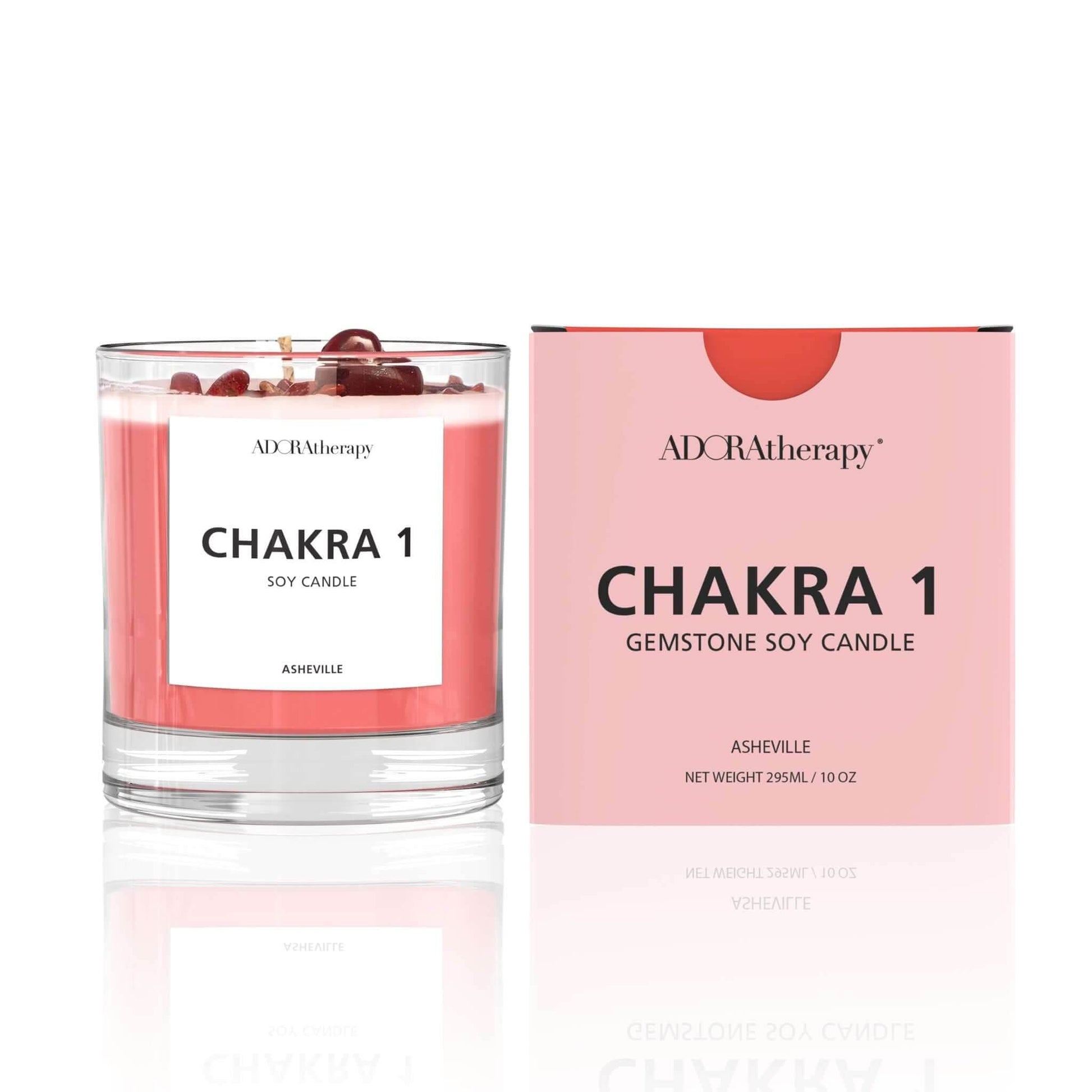 Chakra 1 Red Jasper gemstone soy candle with spicy, woody aroma in clear glass and pink packaging