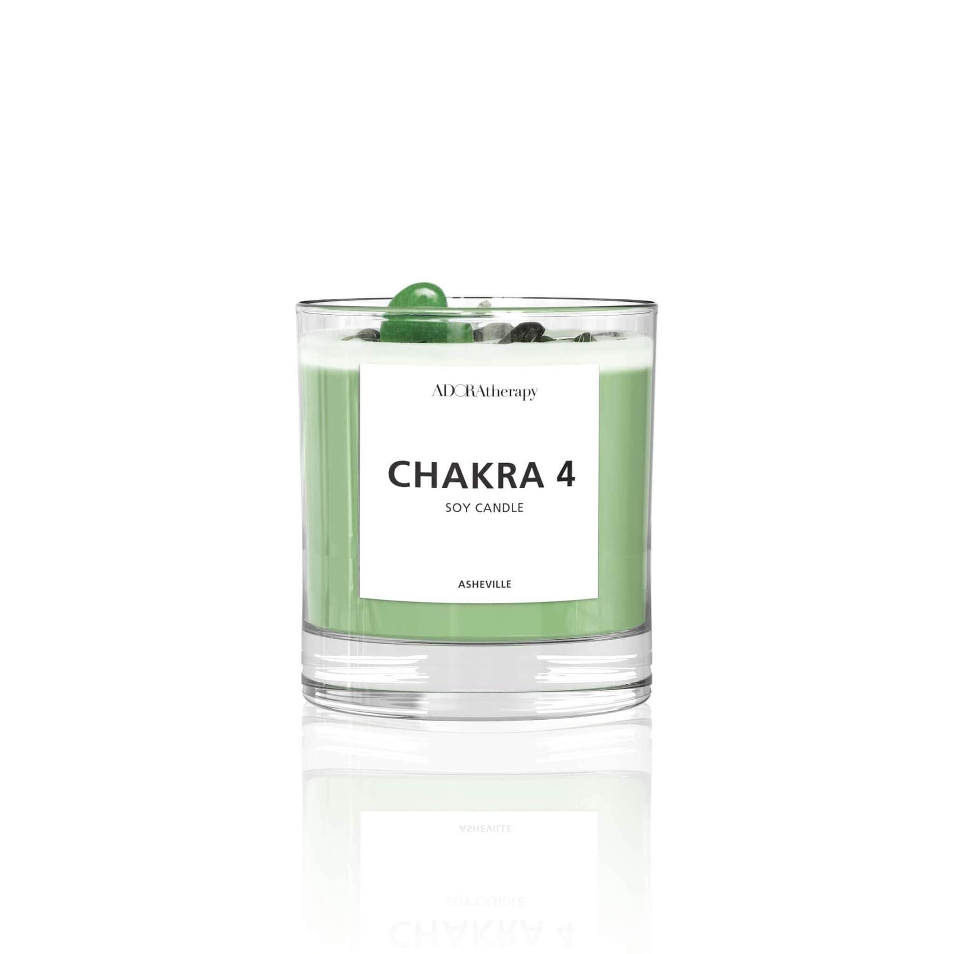 Chakra 4 Aventurine gemstone soy candle with floral scent and green wax in clear glass jar